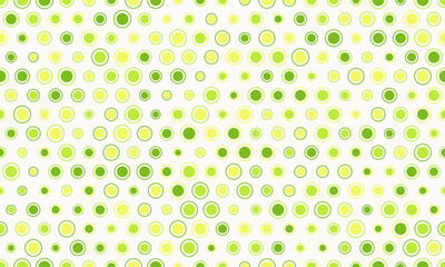 Vibrant green and yellow circles create a dynamic, playful pattern. Perfect for backgrounds, textures, or website design, this image evokes freshness and energy.