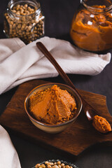 Soybean paste for snack in a bowl on the table vertical view