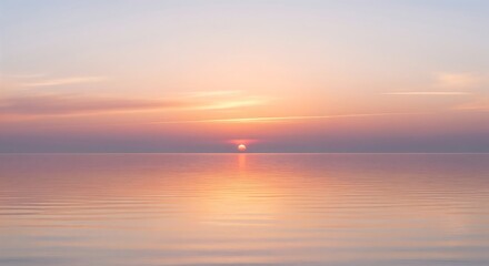 Obraz premium Calm sunset over the sea with pink and orange tones.