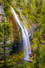 Popular Narada Falls Cascading Along Green Forest