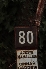 building, flight, board, transportation, signage, exit numbers , yellow