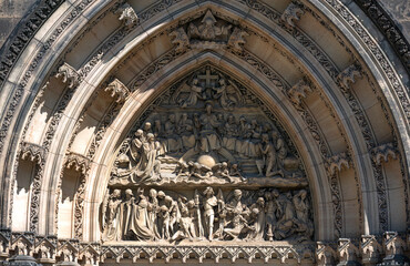 Obraz premium Intricate stone carving above a Basilica of Sts Peter and Paul cathedral doorway. Prague, Czech Republic