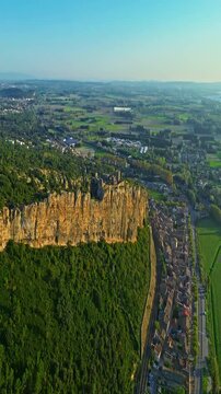  Mornas Fortress stands majestically on top of a rocky cliff. The Fortress of Mornas is a medieval fortress above the village of the same name in the French department of Vaucluse