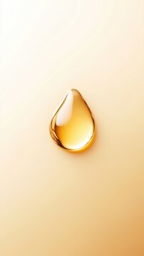 Golden macro drop of batana oil on smooth skin, symbolizing deep hydration, natural glow, and minimalist skincare aesthetics.
