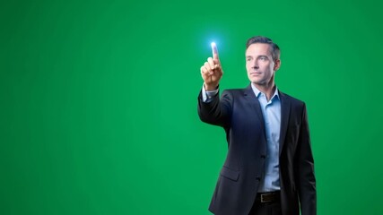 Caucasian businessman working with virtual screen. Man pushing invisible button with glowing effect on green screen. Digital technology for business presentation. - Powered by Adobe