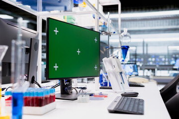 Isolated screen computer monitor in high tech laboratory used for molecular analysis research. Chroma key PC display in medical research facility lab used for DNA data comparison
