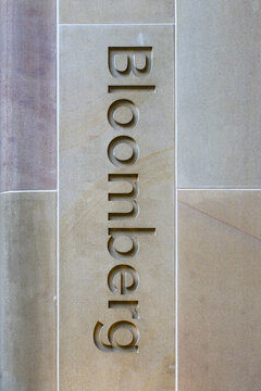 London, UK - August 20, 2025; Vertical sign for Bloomberg financial information company on stone building exterior