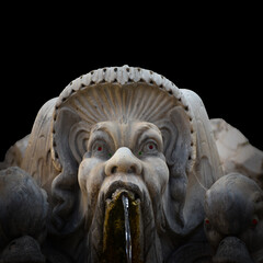 Ancient Stone Mask Fountain – Baroque Sculpture of Grotesque Face with Water Flow, Rome
