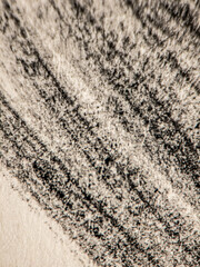 Abstract charcoal drawing texture on rough paper background
