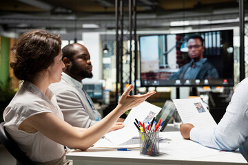 African american candidate speaking with recruiting team during online interview via video conference, exploring job application and qualifications to ensure alignment with vacancy requirements.