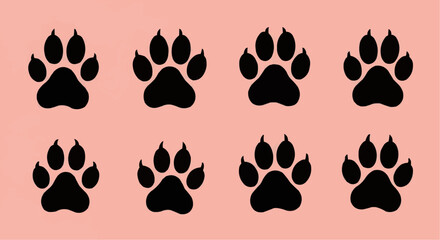Fototapeta premium Eight black paw prints arranged in two rows on a light pink background create a simple pattern