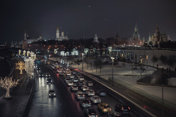 Christmas holidays in the city,  view of Zaryadye Park and the Kremlin from the Floating Bridge in Moscow