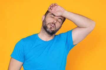 Sad man got migraine. Man with strong headache. Stressed, tired man from headache. Headache, tiredness and stress, migraine. Headache pain concept.