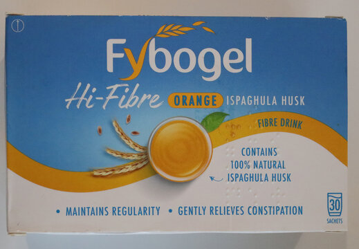 Norwich, England: October 26 2025 Fybogel Hi-Fibre Orange ispaghula husk fibre drink box and sachet photographed with dosage information and ingredients visible