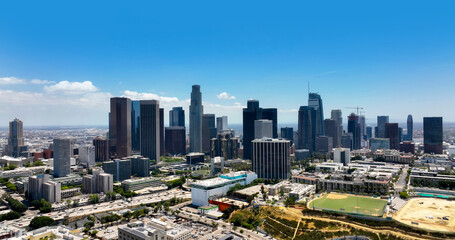 Aerial panorama of Los Angeles city skyline with skyscrapers. Drone shot of downtown Los Angeles. Wide drone panorama of Los Angeles. Aerial cityscape view of LA. Panoramic skyline of Los Angeles.