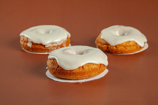 Cream topping and filled brioche doughnut coffee flavour.