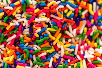 Colorful Sprinkles on Bright Yellow Background