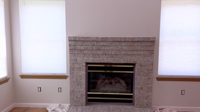 Centered fireplace with uncovered floor