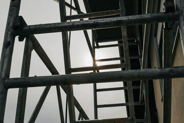 Fototapeta premium Construction Scaffolding Against Building Facade.Close-Up View of Scaffolding Against Building.