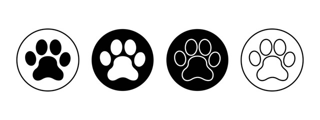 Set of dog or cat paw silhouettes in round shapes. Puppy or kitty footprint stamps isolated on white background. Veterinary clinic or pet shop pictograms. Vector flat illustration. © vikusha_art