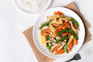 Stir fried vegetables, Green pea, Carrot, Baby corn and Shimeji mushroom with soy sauce, Asian vegetarian food, Healhty eating