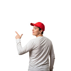 Young adult woman in a red baseball cap and white long-sleeve shirt, looking back over her shoulder and pointing to the left with a playful expression on a solid transparent background.