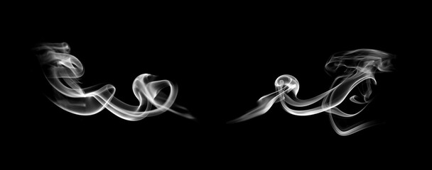 Abstract white smoke on black background forming elegant swirl shapes. Concept of mystery, creativity, vapor, air movement, and energy flow. Perfect for design, background, and artistic compositions.