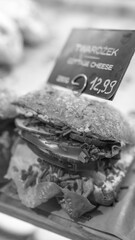 Freshly prepared sandwich in Warsaw cafe highlighting urban dining and culinary culture