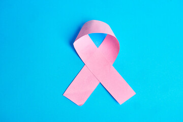 Pink ribbon as a clear emblem of breast cancer awareness expressing support prevention hope and...