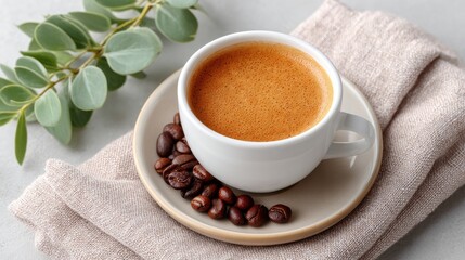 Aromatic Rich Coffee Brew in White Cup Garnished with Roasted Beans and Green Eucalyptus Sprig on Textured Napkin with Soft Natural Lighting