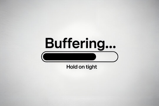 The Buffer's Waiting Game: The digital world pauses, reflecting a moment of anticipation, as the buffering symbol appears, inviting the viewer to hold fast.
