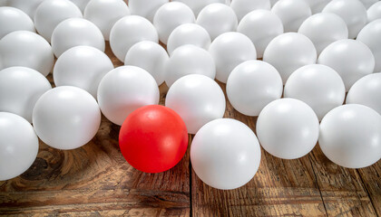 A red ball among the white balls
