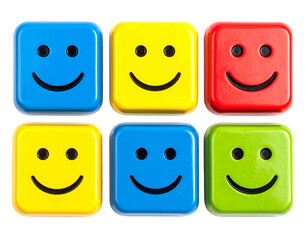 Six square blocks with happy faces arranged in two rows on a dark background with soft lighting