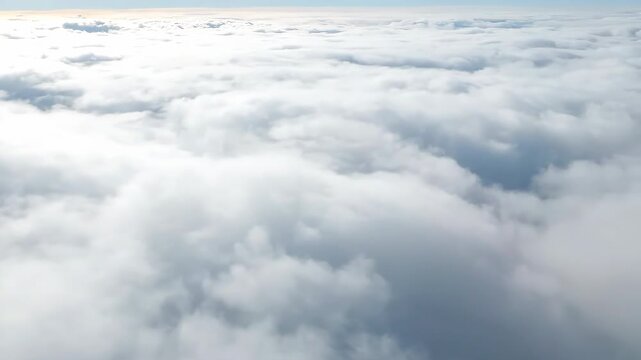 Serene wide shot of a vast sky filled with soft, textured milky white clouds moving slowly across the horizon weather, serene, open