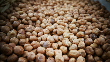 Close-up of many peeled hazelnuts