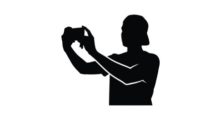 A person holding a camera and taking a picture in a striking black silhouette against a white background silhouette