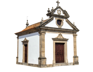 Small white chapel with stone trim, orange tile roof, and black background, captured in daylight