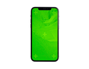 Smartphone featuring a vibrant green screen with tracking crosses against a stark black backdrop