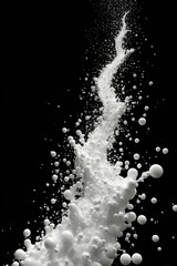 White liquid surge against black, drips and splatters seen