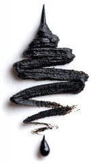 Spiral smear of thick, black liquid