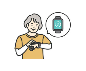 スマートウォッチで万歩計アプリを確認するシニア女性