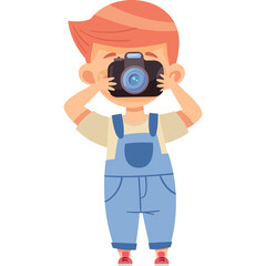 Young boy wearing blue overalls and a white shirt holds a black camera to his face with both hands capturing a photo with red hair and shoes on a white background