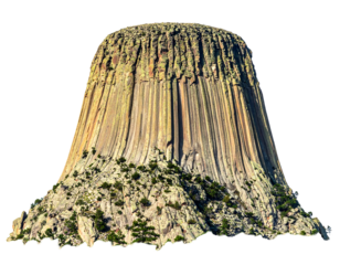 Striking image of a dramatic columnar rock formation against a black background