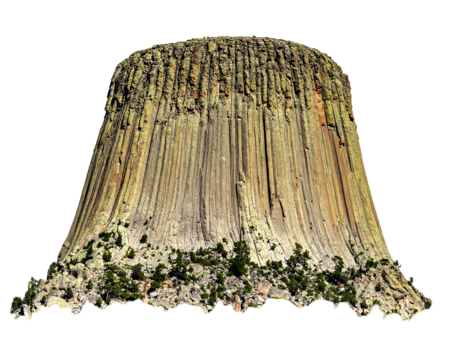 Striking vertical rock formations create a unique landscape, topped with textured rock and accented by green vegetation