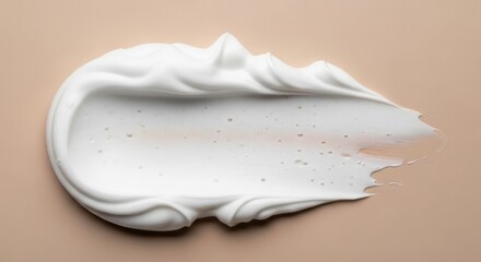 A  shot showcases a textured white creamy substance, gracefully smeared across a neutral, soft beige background, creating an abstract composition and a feeling of smoothness and skincare, evoking...