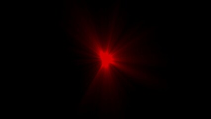 Bright red starburst light effect on black background