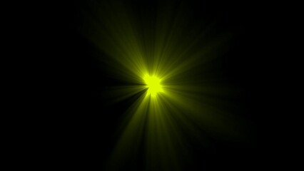 Obraz premium Bright Yellow Starburst Light Effect on Black Background