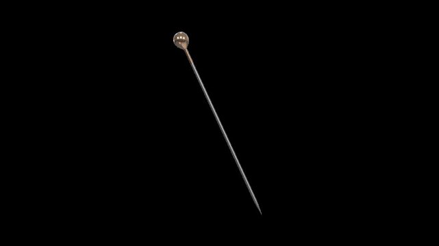 Close-Up of a Metallic Pin on Black Background