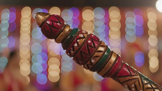 Ornate Wooden Danda with Festive Bokeh Lights