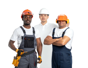 Diverse trio of construction workers in workwear and hard hats pose against a dark backdrop
